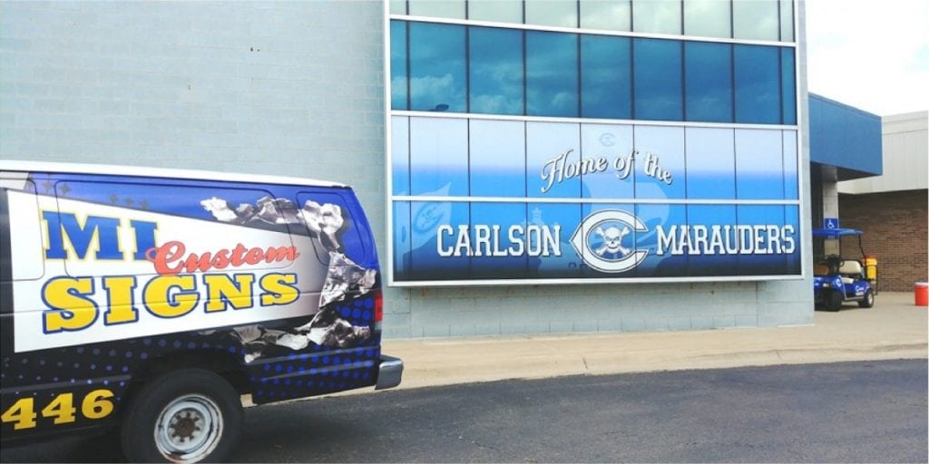 Carlson High School Window Perf Graphics MI Custom Signs Taylor MI