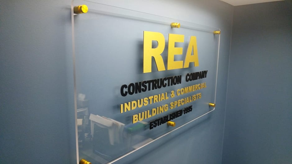 REA Construction Acrylic Standoff Panel Lobby Sign MI Custom Signs Taylor MI