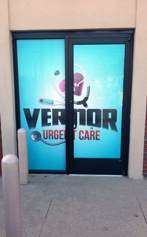 Vernor Urgent Care Door WindowPerf MI Custom Signs Taylor MI
