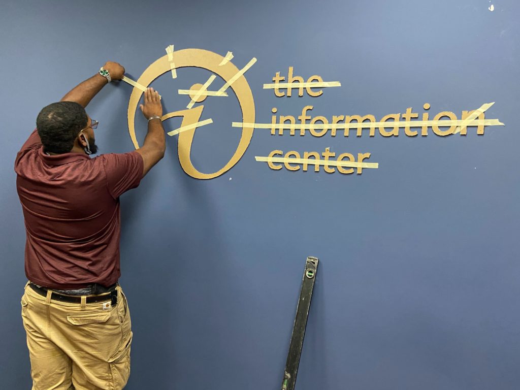 The Information Center 3d Wall Sign During Installation MI Custom Signs Taylor MI